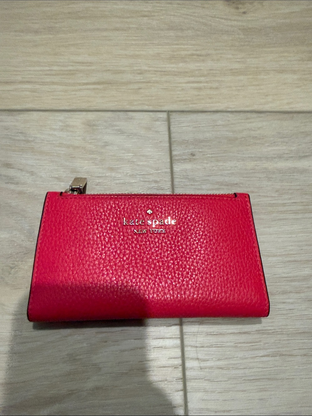 kate spade hot pink pebbled leather zip wallet